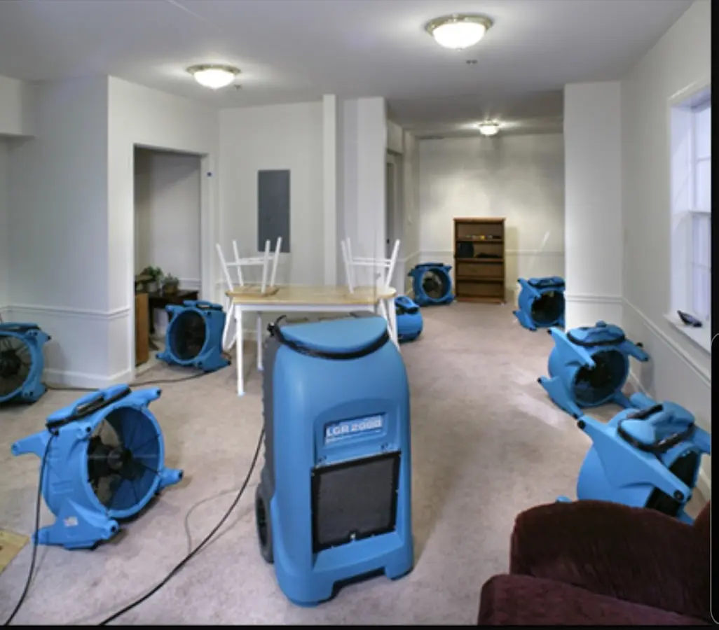Air movers and dehumidifier setup for Water Damage Restoration in Nantucket